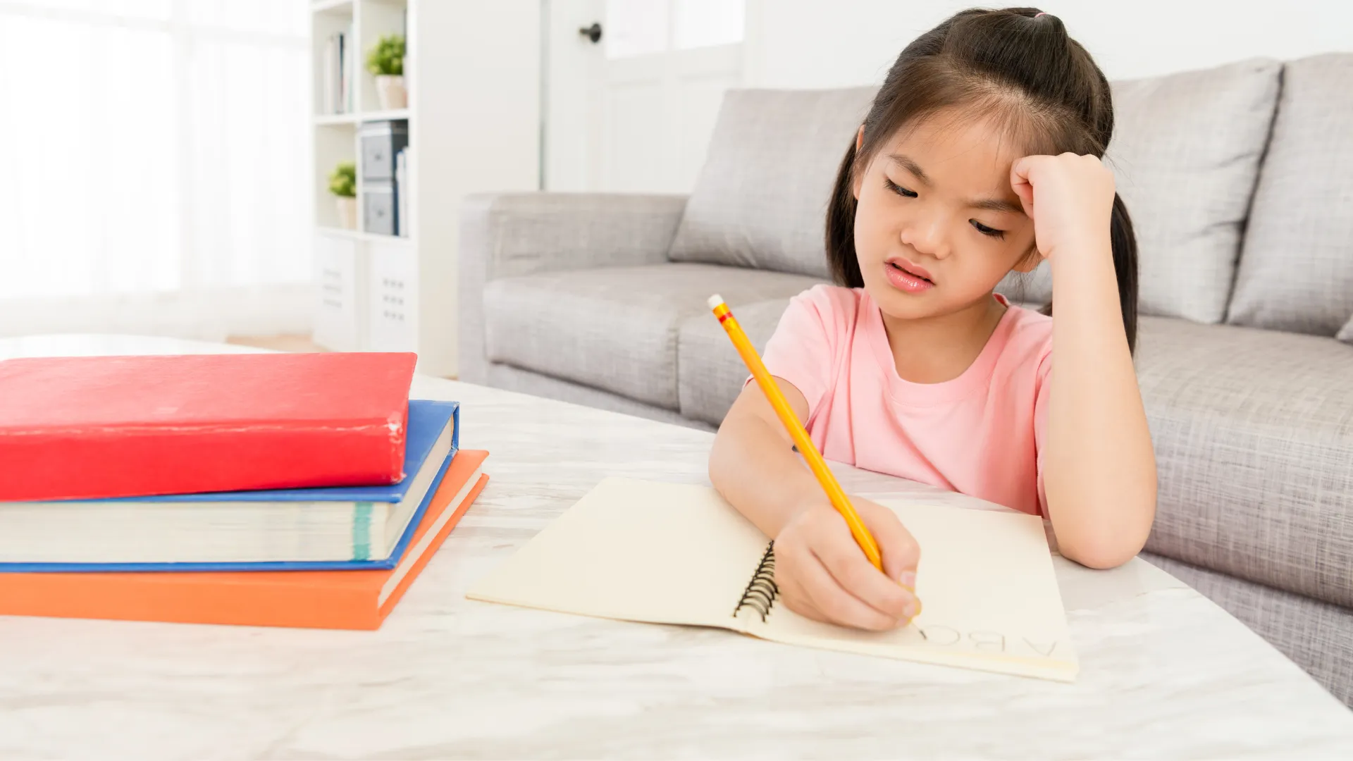 A girl doing is English homework