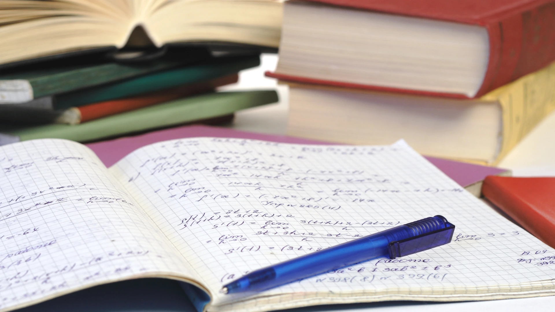 Science notebook with pen